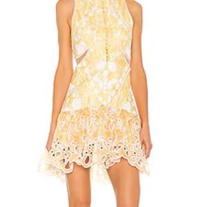 Revolve Ruffle Dress in Yellow
RAISSA Small